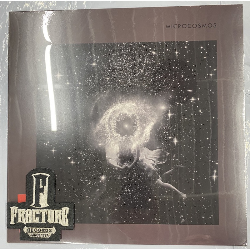 DELOS - MICROCOSMOS VINYL LIMITED EDITION, NUMBERED, SILVER/BLACK MARBLED